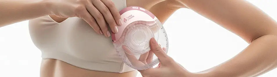 lifestyle image of a fit mom holding and showing off her solyymoms breast pump